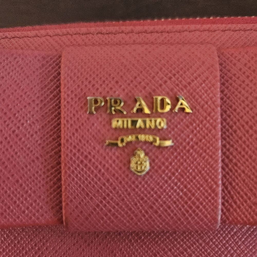 Authentic Prada Pink Bow Wallet.